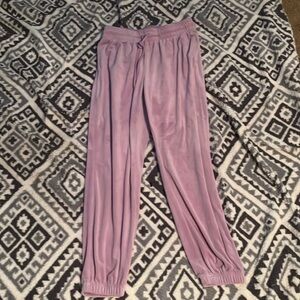 They are purple sweatpants kid size small four through six